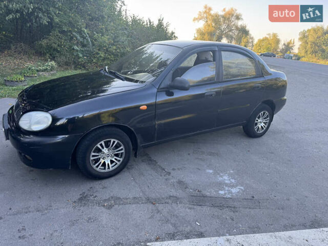 Чорний Деу Ланос, об'ємом двигуна 1.5 л та пробігом 200 тис. км за 1350 $, фото 1 на Automoto.ua