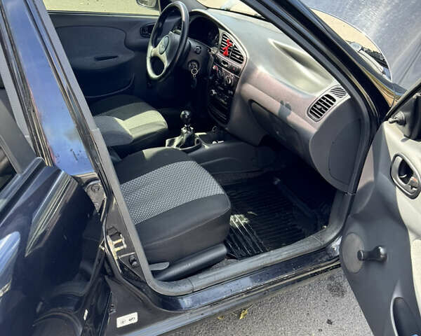 Черный Дэу Ланос, объемом двигателя 1.5 л и пробегом 175 тыс. км за 2800 $, фото 12 на Automoto.ua