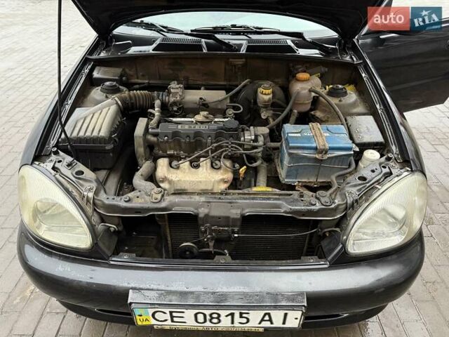 Черный Дэу Ланос, объемом двигателя 0 л и пробегом 150 тыс. км за 1250 $, фото 31 на Automoto.ua