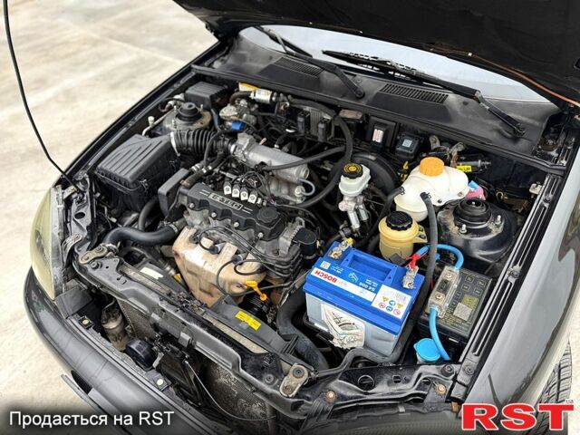 Чорний Деу Ланос, об'ємом двигуна 1.5 л та пробігом 240 тис. км за 2750 $, фото 10 на Automoto.ua