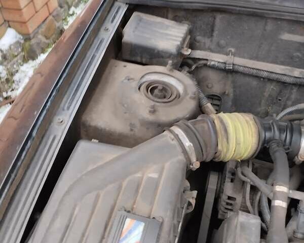 Черный Дэу Ланос, объемом двигателя 1.5 л и пробегом 145 тыс. км за 1200 $, фото 1 на Automoto.ua