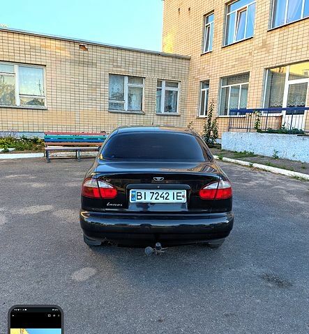 Черный Дэу Ланос, объемом двигателя 1.5 л и пробегом 155 тыс. км за 2600 $, фото 2 на Automoto.ua