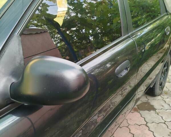 Черный Дэу Ланос, объемом двигателя 1.5 л и пробегом 270 тыс. км за 2850 $, фото 23 на Automoto.ua