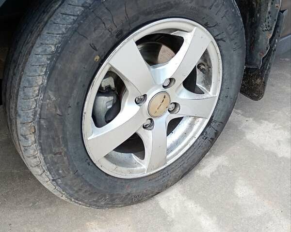 Черный Дэу Ланос, объемом двигателя 1.5 л и пробегом 310 тыс. км за 1700 $, фото 2 на Automoto.ua