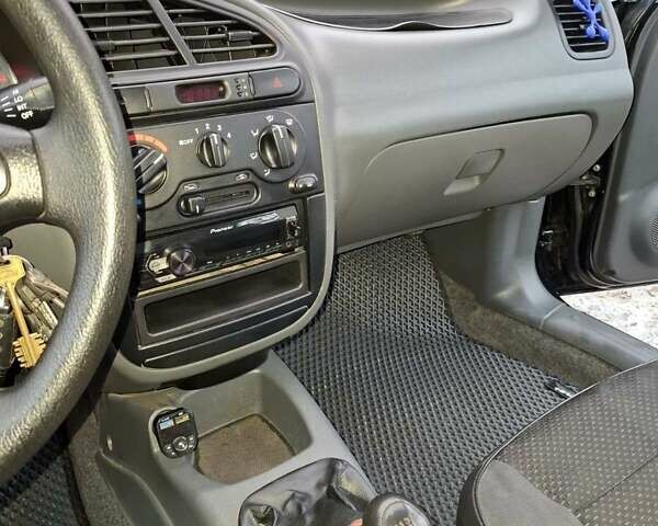 Чорний Деу Ланос, об'ємом двигуна 1.6 л та пробігом 63 тис. км за 4200 $, фото 4 на Automoto.ua