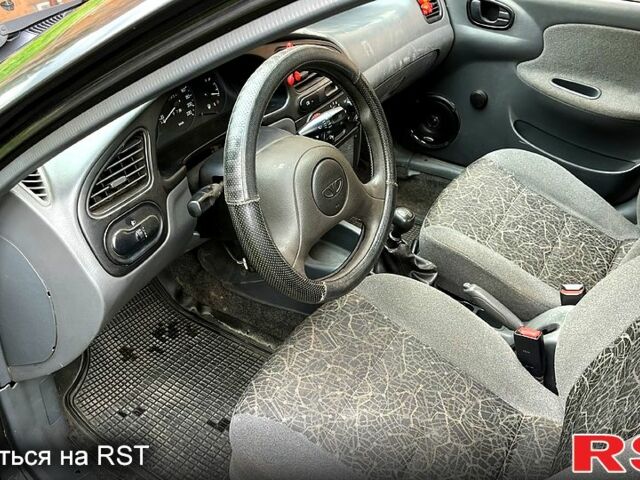 Дэу Ланос 2007 в Харькове на Automoto.ua Черный Дэу Ланос, объемом двигателя 1.5 л и пробегом 176 тыс. км за 3100 $, фото 4 на Automoto.ua