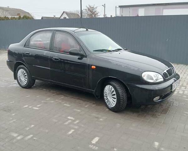 Черный Дэу Ланос, объемом двигателя 1.5 л и пробегом 224 тыс. км за 1499 $, фото 1 на Automoto.ua