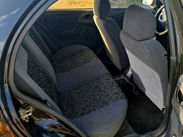 Черный Дэу Ланос, объемом двигателя 1.5 л и пробегом 217 тыс. км за 2800 $, фото 3 на Automoto.ua