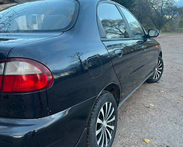 Деу Ланос 2007 у Черняхове на Automoto.ua Чорний Деу Ланос, об'ємом двигуна 1.5 л та пробігом 113 тис. км за 2700 $, фото 3 на Automoto.ua