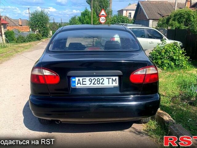 Черный Дэу Ланос, объемом двигателя 1.5 л и пробегом 255 тыс. км за 3200 $, фото 1 на Automoto.ua