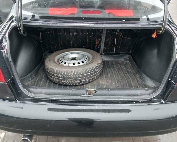 Черный Дэу Ланос, объемом двигателя 1.5 л и пробегом 224 тыс. км за 1499 $, фото 13 на Automoto.ua