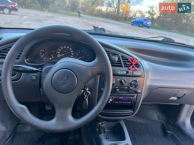 Деу Ланос 2007 у Черняхове на Automoto.ua Чорний Деу Ланос, об'ємом двигуна 1.5 л та пробігом 113 тис. км за 2700 $, фото 9 на Automoto.ua