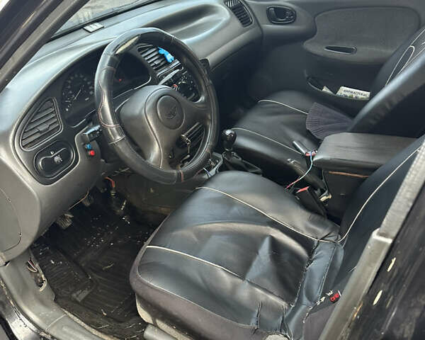 Чорний Деу Ланос, об'ємом двигуна 1.5 л та пробігом 150 тис. км за 1700 $, фото 8 на Automoto.ua