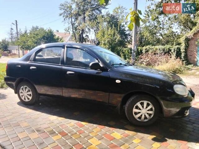 Чорний Деу Ланос, об'ємом двигуна 1.5 л та пробігом 255 тис. км за 2300 $, фото 2 на Automoto.ua