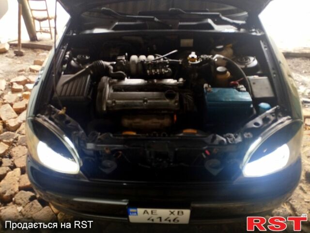 Черный Дэу Ланос, объемом двигателя 1.6 л и пробегом 249 тыс. км за 3500 $, фото 12 на Automoto.ua