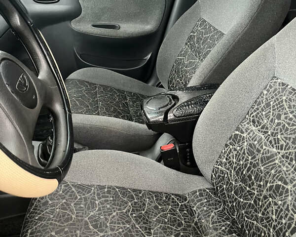 Черный Дэу Ланос, объемом двигателя 1.5 л и пробегом 201 тыс. км за 1000 $, фото 8 на Automoto.ua