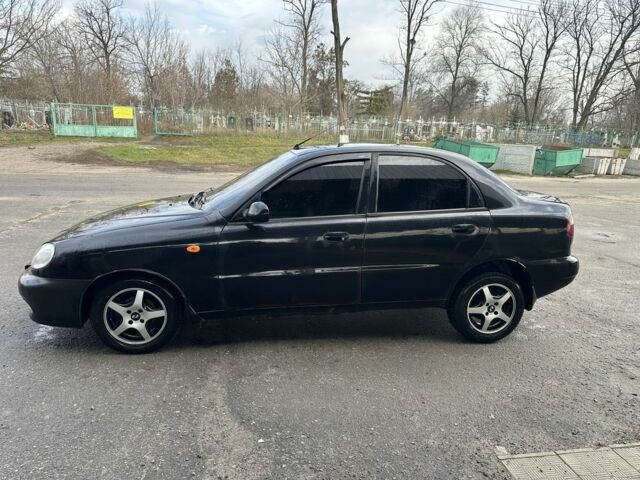 Черный Дэу Ланос, объемом двигателя 1.5 л и пробегом 150 тыс. км за 1700 $, фото 2 на Automoto.ua