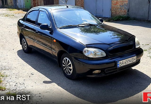 Черный Дэу Ланос, объемом двигателя 1.5 л и пробегом 200 тыс. км за 2350 $, фото 1 на Automoto.ua