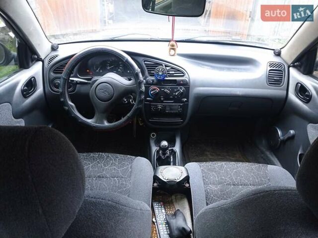 Черный Дэу Ланос, объемом двигателя 1.5 л и пробегом 141 тыс. км за 1700 $, фото 7 на Automoto.ua