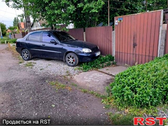 Черный Дэу Ланос, объемом двигателя 1.4 л и пробегом 222 тыс. км за 2100 $, фото 11 на Automoto.ua