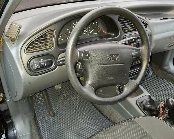 Чорний Деу Ланос, об'ємом двигуна 1.6 л та пробігом 63 тис. км за 4200 $, фото 3 на Automoto.ua