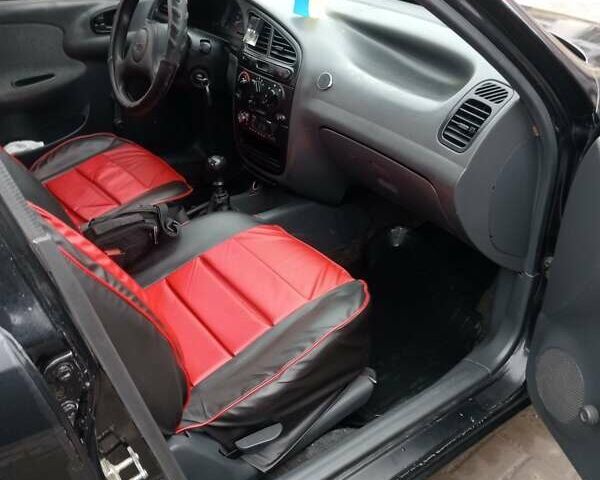 Черный Дэу Ланос, объемом двигателя 1.5 л и пробегом 224 тыс. км за 1499 $, фото 19 на Automoto.ua