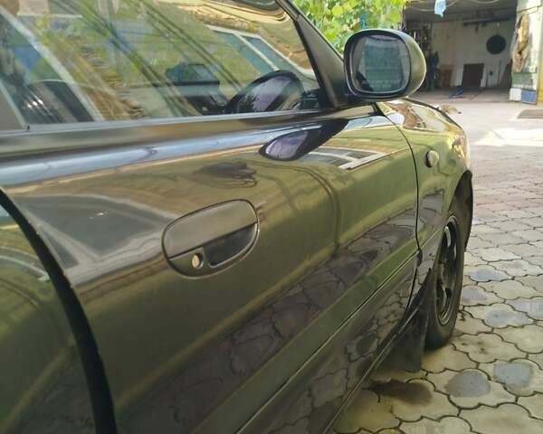 Черный Дэу Ланос, объемом двигателя 1.5 л и пробегом 270 тыс. км за 2850 $, фото 19 на Automoto.ua