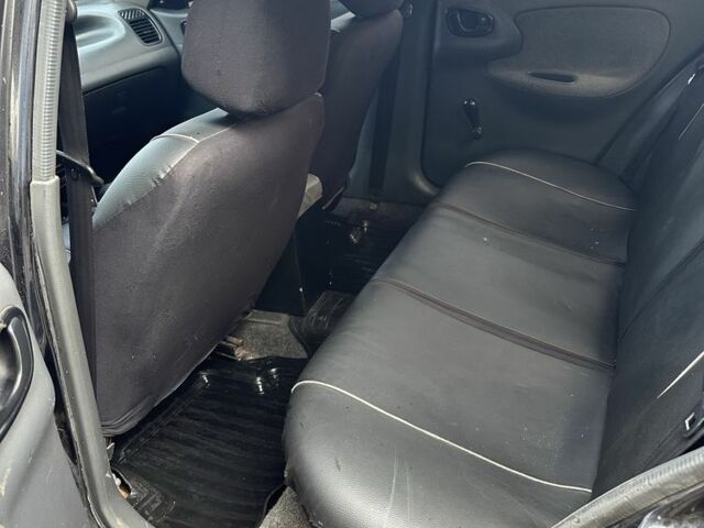 Черный Дэу Ланос, объемом двигателя 1.5 л и пробегом 150 тыс. км за 1700 $, фото 9 на Automoto.ua