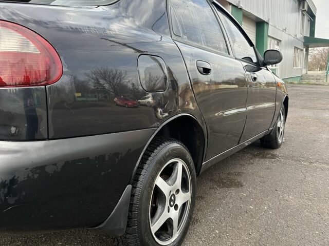 Черный Дэу Ланос, объемом двигателя 1.5 л и пробегом 150 тыс. км за 1700 $, фото 7 на Automoto.ua