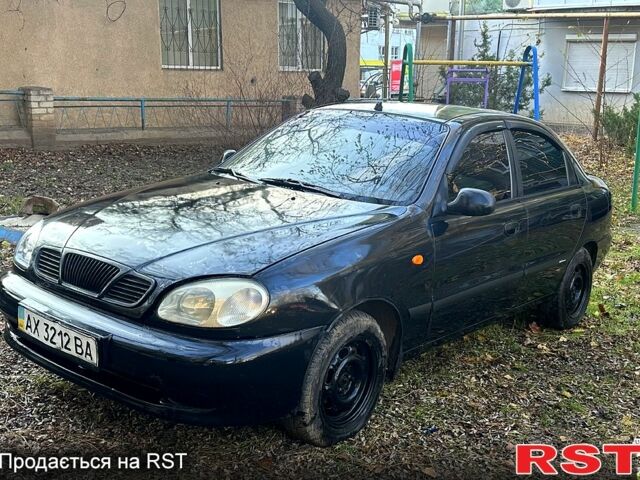 Чорний Деу Ланос, об'ємом двигуна 1.5 л та пробігом 363 тис. км за 1420 $, фото 1 на Automoto.ua