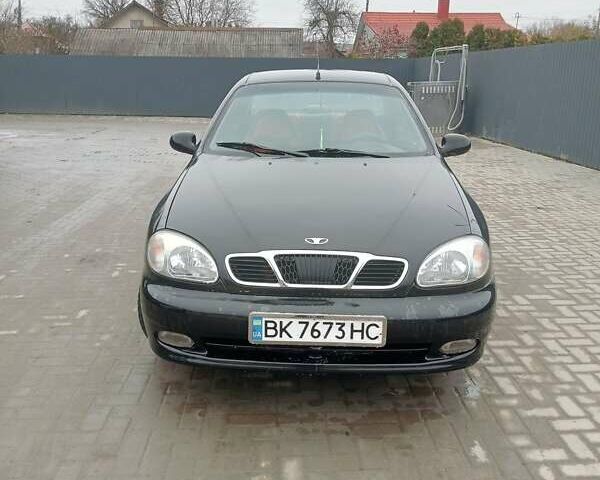 Черный Дэу Ланос, объемом двигателя 1.5 л и пробегом 224 тыс. км за 1499 $, фото 5 на Automoto.ua