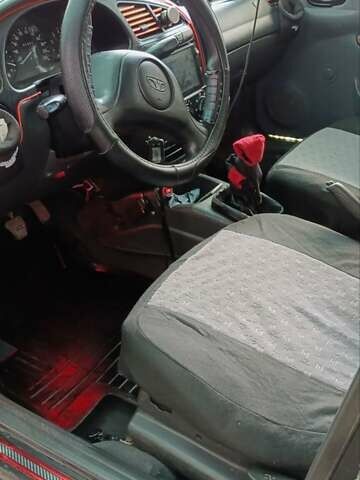 Черный Дэу Ланос, объемом двигателя 1.5 л и пробегом 236 тыс. км за 2300 $, фото 4 на Automoto.ua