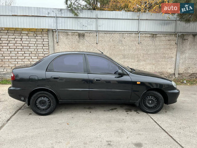 Черный Дэу Ланос, объемом двигателя 1.6 л и пробегом 140 тыс. км за 2700 $, фото 2 на Automoto.ua