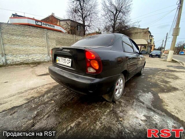 Черный Дэу Ланос, объемом двигателя 1.5 л и пробегом 220 тыс. км за 1350 $, фото 2 на Automoto.ua