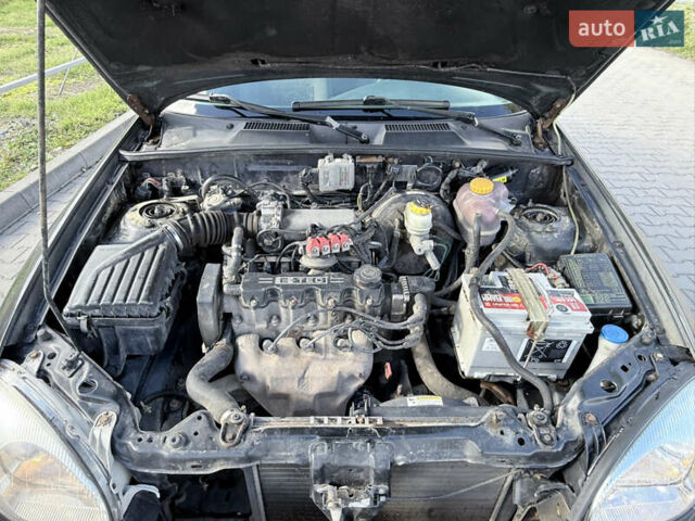 Чорний Деу Ланос, об'ємом двигуна 1.5 л та пробігом 190 тис. км за 1350 $, фото 9 на Automoto.ua