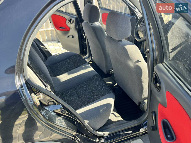 Чорний Деу Ланос, об'ємом двигуна 1.5 л та пробігом 180 тис. км за 2900 $, фото 10 на Automoto.ua