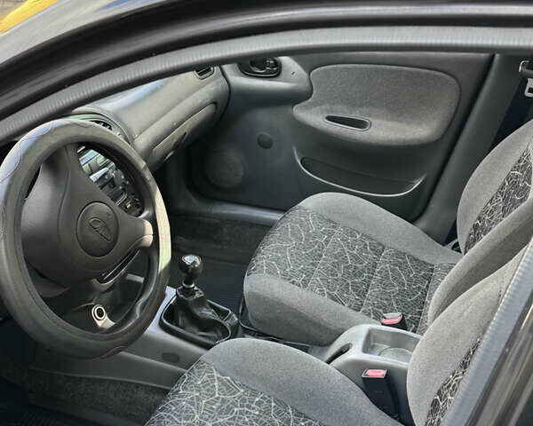 Чорний Деу Ланос, об'ємом двигуна 1.5 л та пробігом 253 тис. км за 2200 $, фото 5 на Automoto.ua