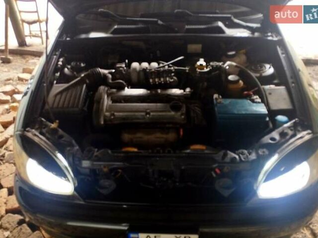 Черный Дэу Ланос, объемом двигателя 1.6 л и пробегом 249 тыс. км за 3450 $, фото 11 на Automoto.ua