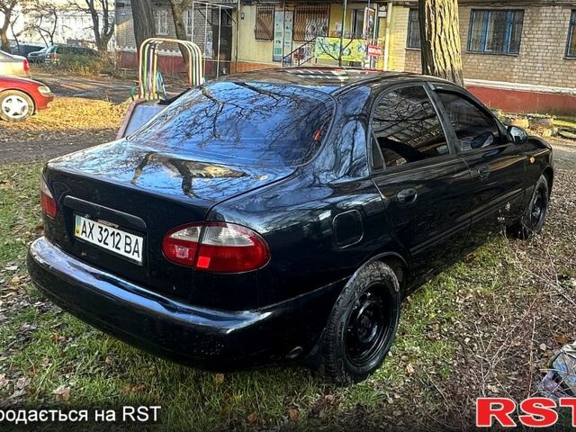 Чорний Деу Ланос, об'ємом двигуна 1.5 л та пробігом 363 тис. км за 1420 $, фото 3 на Automoto.ua