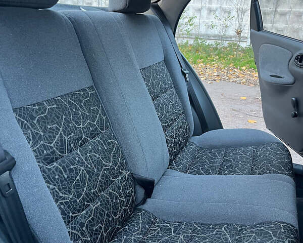 Деу Ланос 2007 у Черняхове на Automoto.ua Чорний Деу Ланос, об'ємом двигуна 1.5 л та пробігом 113 тис. км за 2700 $, фото 7 на Automoto.ua