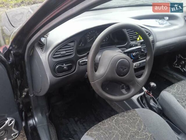 Черный Дэу Ланос, объемом двигателя 1.5 л и пробегом 230 тыс. км за 2350 $, фото 9 на Automoto.ua