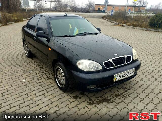 Черный Дэу Ланос, объемом двигателя 1.6 л и пробегом 200 тыс. км за 1600 $, фото 2 на Automoto.ua