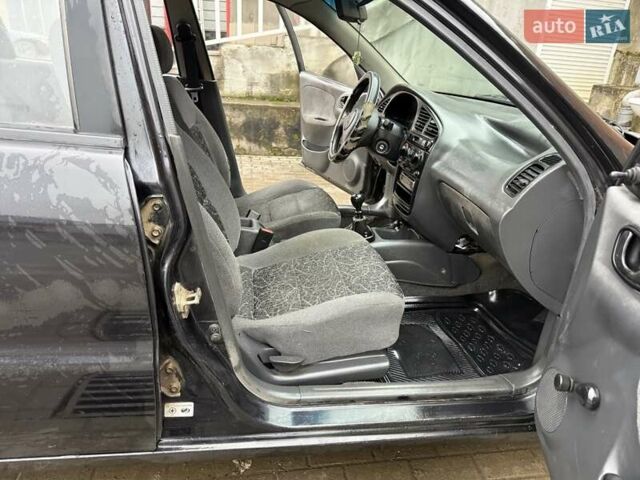 Черный Дэу Ланос, объемом двигателя 0 л и пробегом 150 тыс. км за 1250 $, фото 2 на Automoto.ua