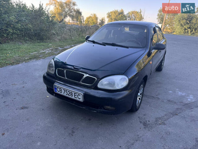Чорний Деу Ланос, об'ємом двигуна 1.5 л та пробігом 200 тис. км за 1350 $, фото 2 на Automoto.ua