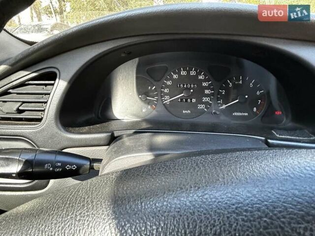 Черный Дэу Ланос, объемом двигателя 1.6 л и пробегом 154 тыс. км за 3500 $, фото 4 на Automoto.ua