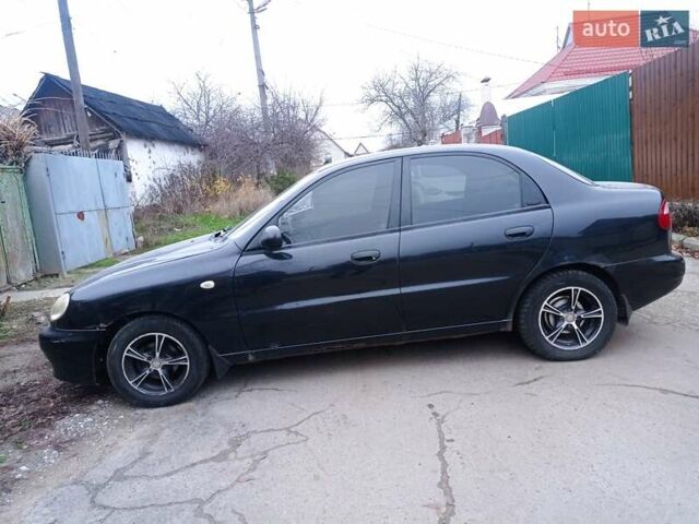 Черный Дэу Ланос, объемом двигателя 1.5 л и пробегом 141 тыс. км за 1700 $, фото 1 на Automoto.ua