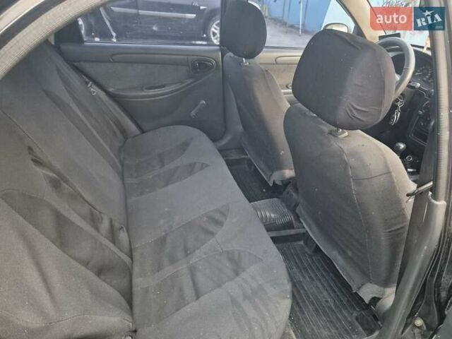 Деу Ланос 2007 у Новомосковске на Automoto.ua Чорний Деу Ланос, об'ємом двигуна 1.5 л та пробігом 252 тис. км за 2500 $, фото 16 на Automoto.ua