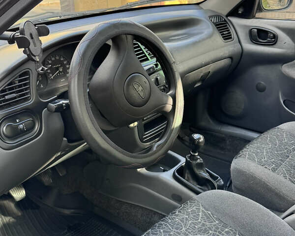 Чорний Деу Ланос, об'ємом двигуна 1.5 л та пробігом 253 тис. км за 2200 $, фото 4 на Automoto.ua