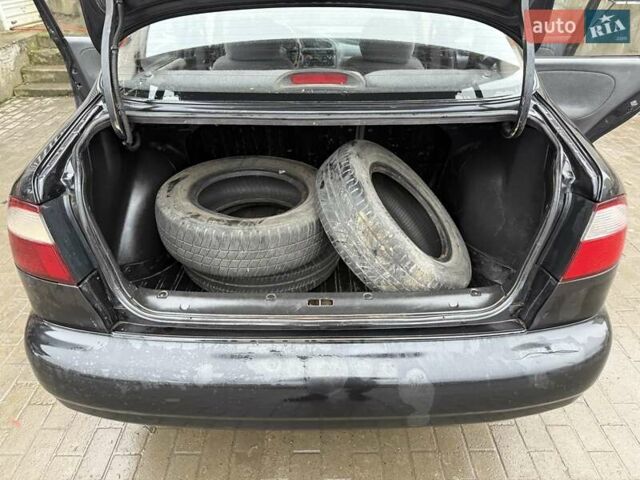 Черный Дэу Ланос, объемом двигателя 0 л и пробегом 150 тыс. км за 1250 $, фото 13 на Automoto.ua