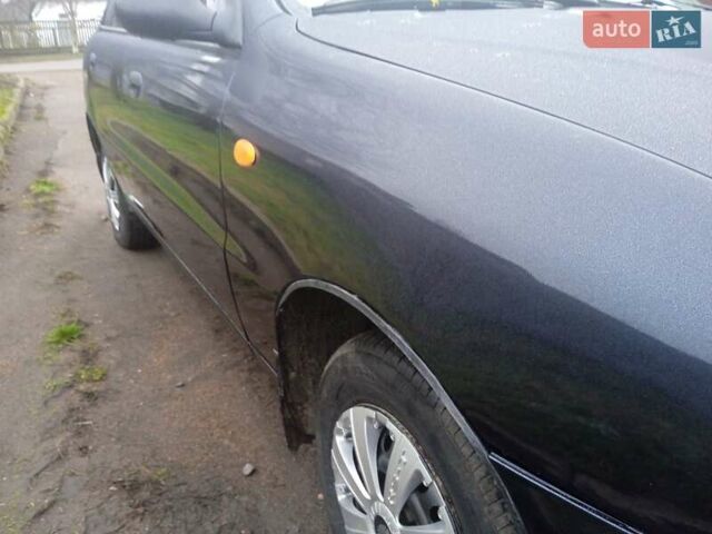 Черный Дэу Ланос, объемом двигателя 1.5 л и пробегом 230 тыс. км за 2350 $, фото 4 на Automoto.ua